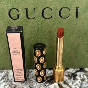 GUCCI Lucy Dark Orange 308 glow and care lip colour